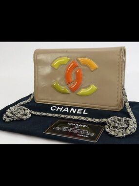 CHANEL Beige Patent Leather Crossbody with Orange and Yellow-Green Logo